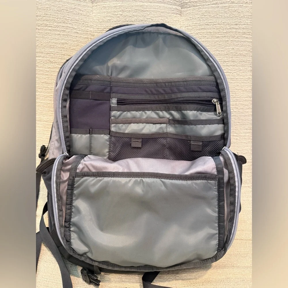 The North Face Gray and Black Backpack with Orange Logo